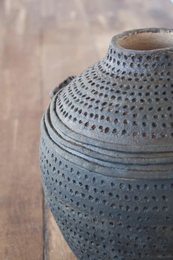 detail of Textured brown vase