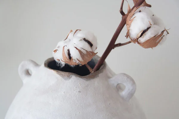 Detail of white Gea vase