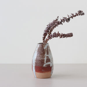 Terracotta vase with rust effect